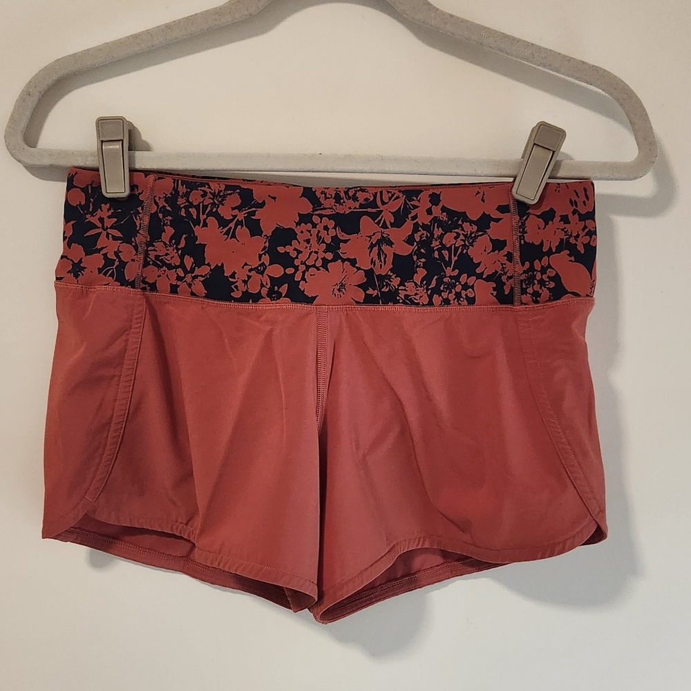 Lululemon womens speed up shorts, high rise, 4" inseam, size 4, orange color